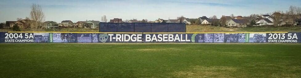 Example of custom printed fence slats installed on baseball field chain link fence
